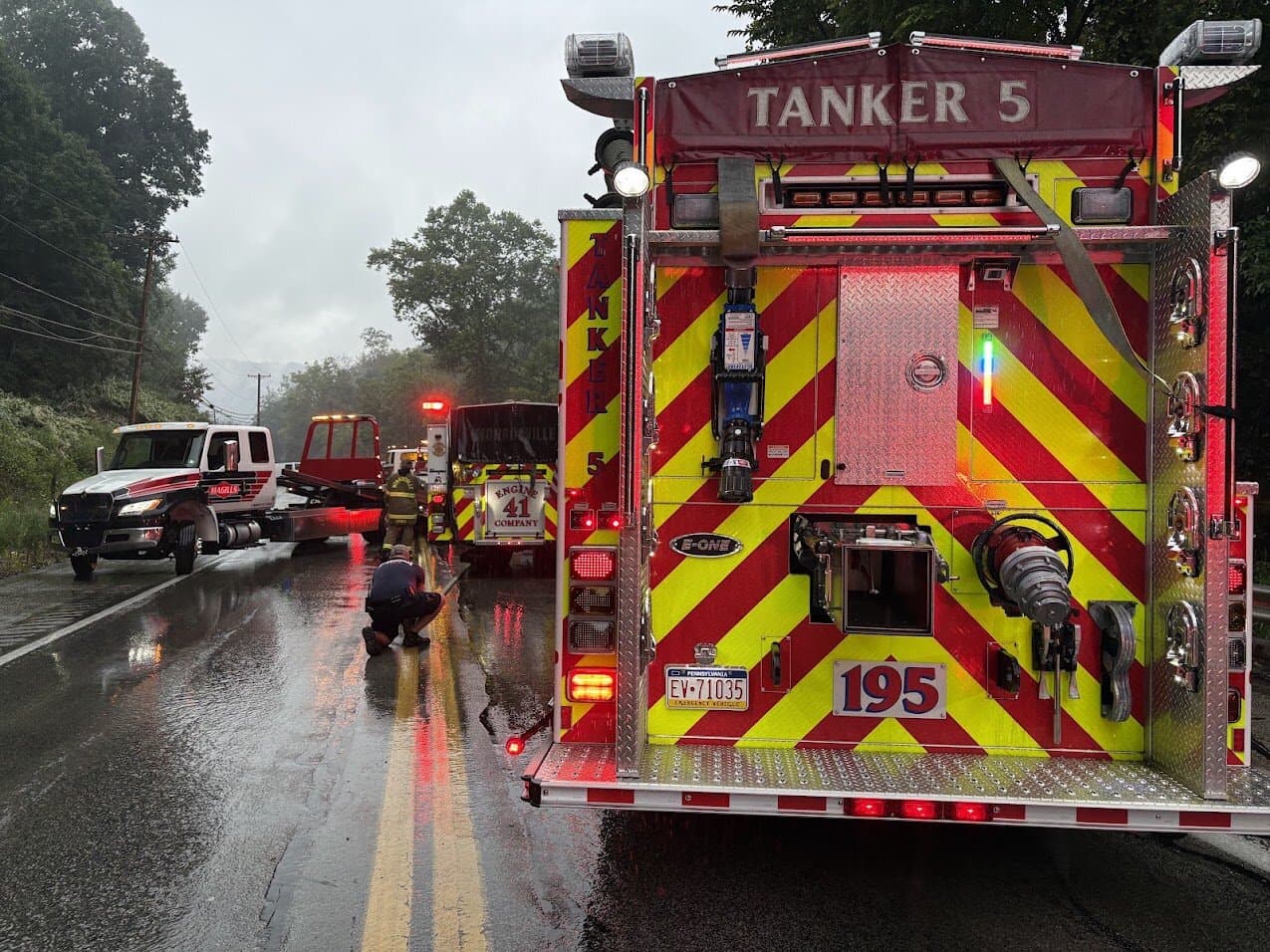 Tanker 5 on a wet road at a car fire