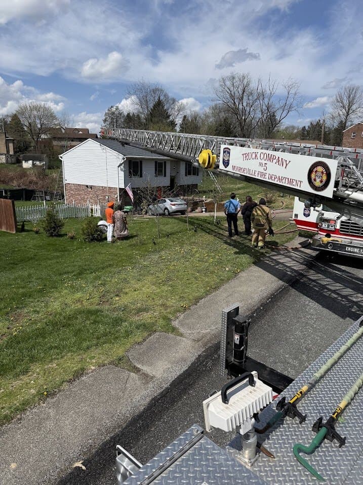 Truck 5's aerial raised at a call